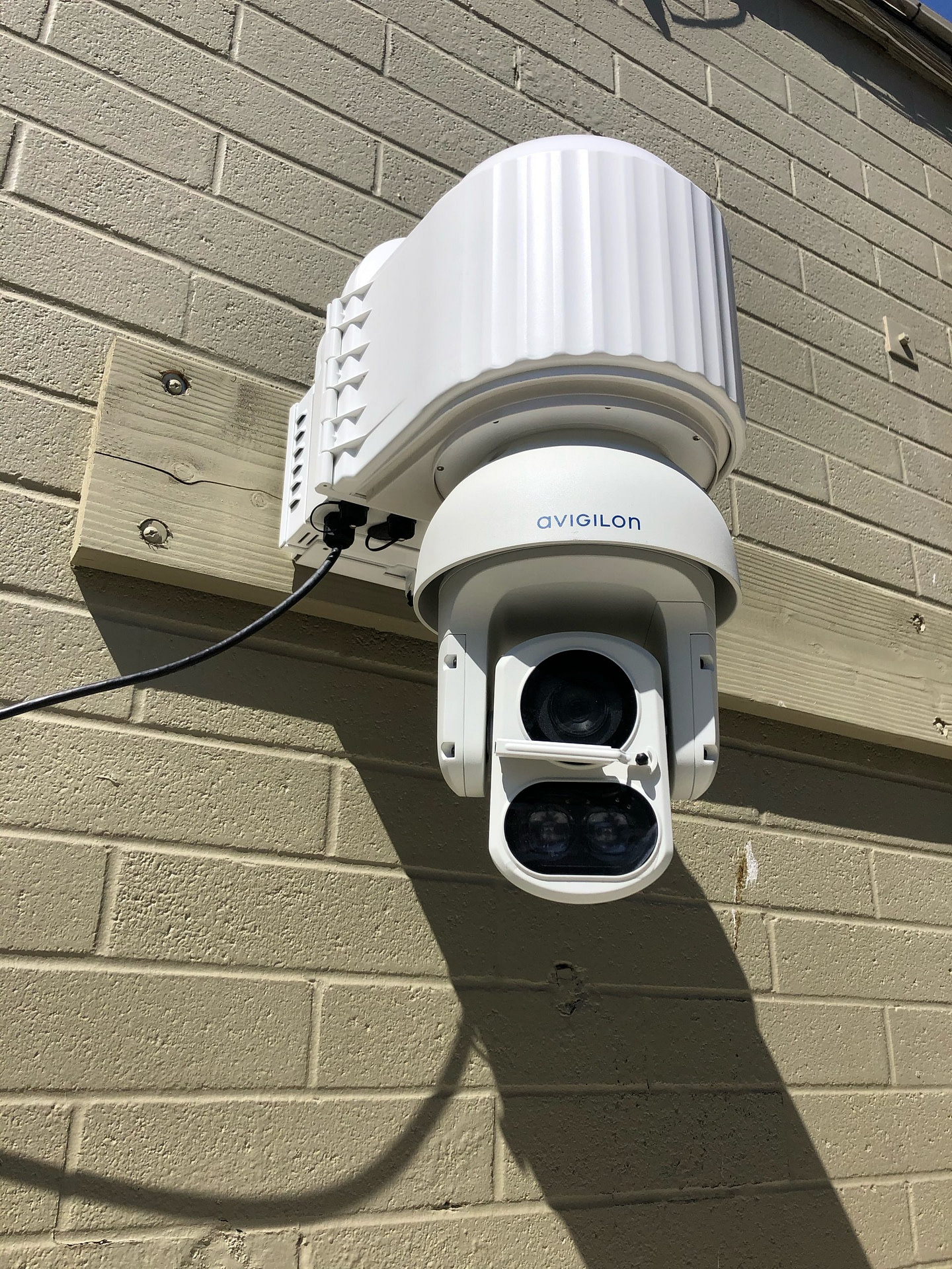 XCold PTZ Camera Enclosure System For Extreme Heat Environments Integrated With An Avigilon PTZ Camera With IR And Wiper Blade 